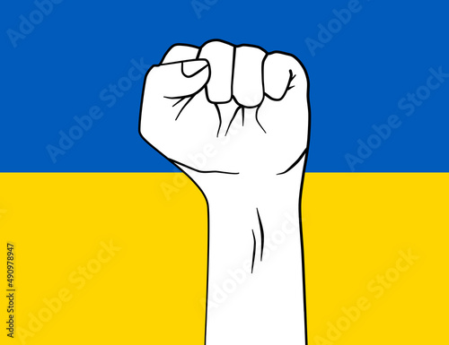 Faust nach oben zeigend mit Ukrainischer Flagge.