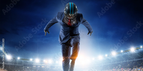 Businessman acting as american football players © Sergey Nivens