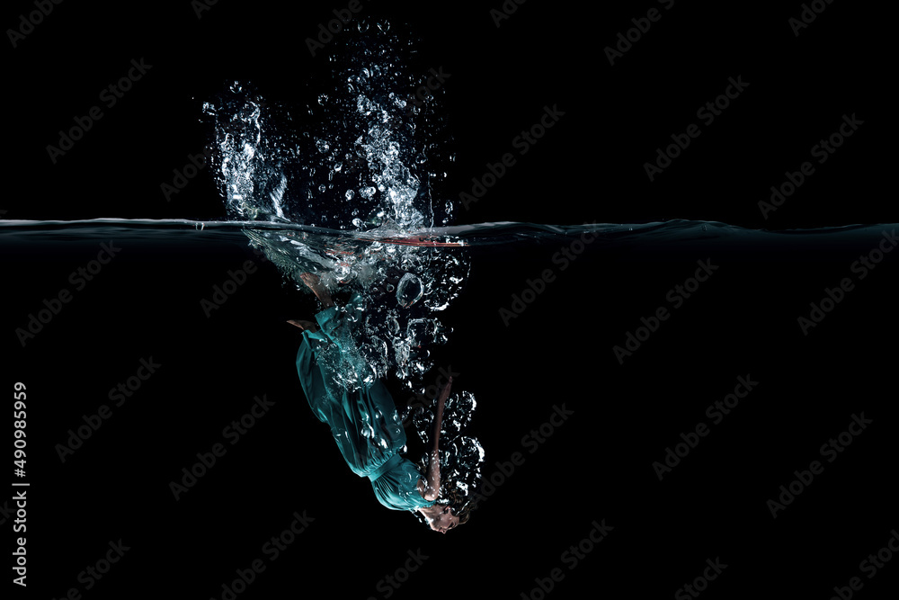 Girl in green dress under water Girl in green dress under water