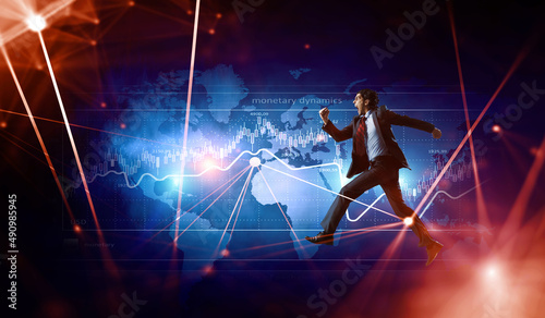 Portrait of energetic businessman running