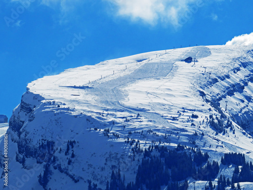 Snow-capped alpine peak Chäserugg (or Chaeserugg, 2261 m) in the Churfirsten mountain range, between the Toggenburg region and Lake Walensee or Lake Walenstadt - Obertoggenburg, Switzerland (Schweiz) photo