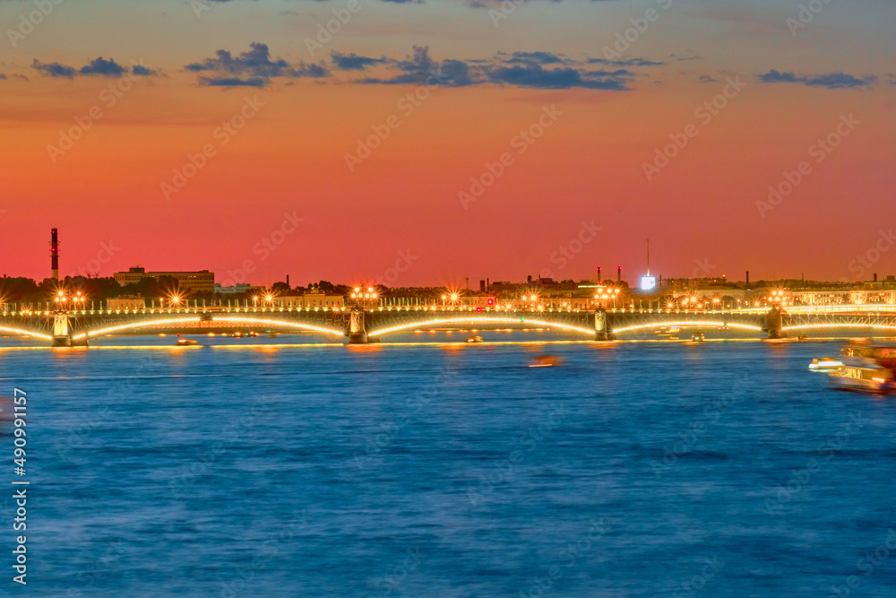 Peter and Paul Fortress, Neva River and Trinity Bridge in St. Petersburg during the White Night, Russia.