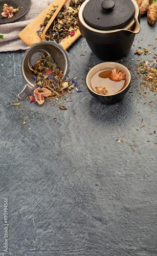 Asian tea set on dark background.