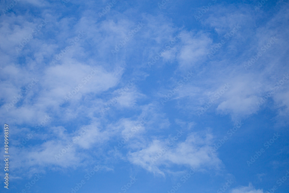 Clouds and sky,blue sky background with tiny clouds.