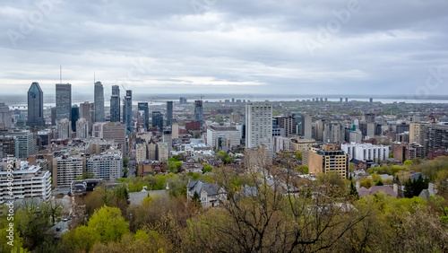Panoramic view of the city center of Montreal from the Mount Royal (Mont Royal), a large intrusive rock hill or small mountain, west of Downtown Montreal in the province of Quebec, Canada