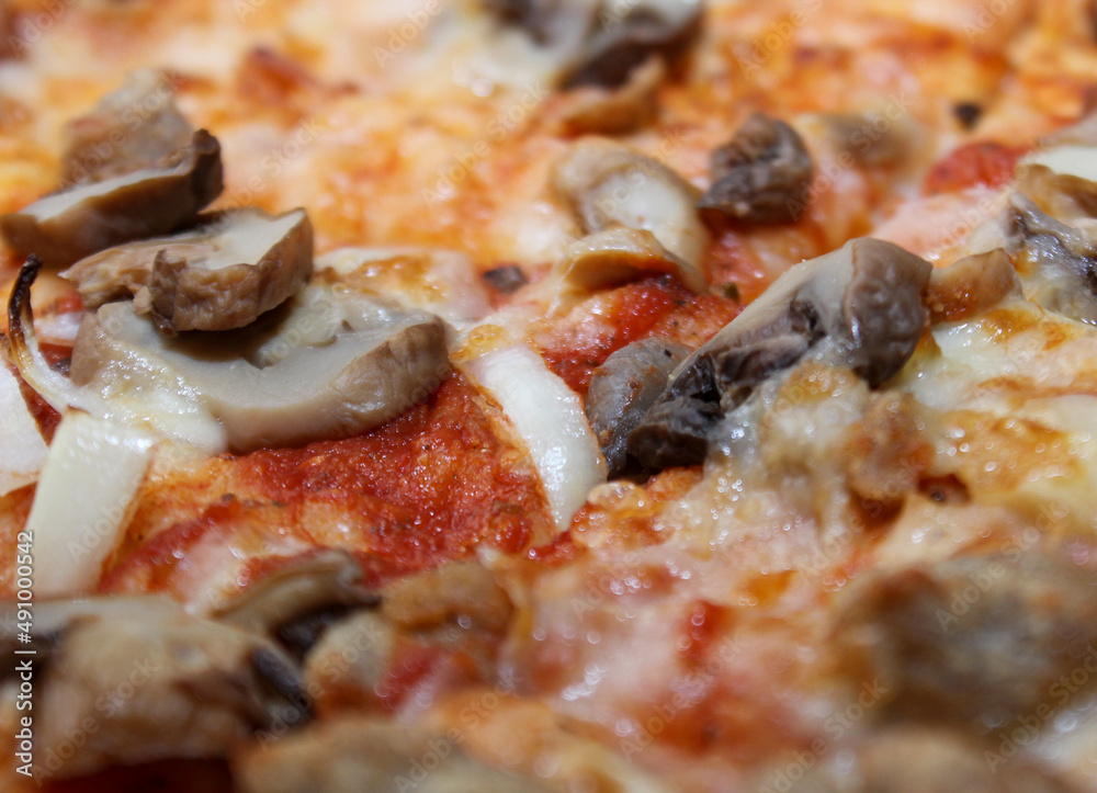 food background pizza texture close up of Pizza with mozzarella ham mushrooms and vegetables texture food background pizza texture close up of Pizza with mozzarella ham mushrooms and vegetables texture