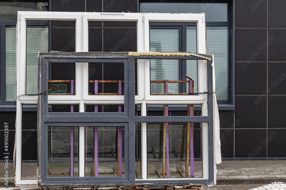 New sealed glass units at building site. Preparation for the ...