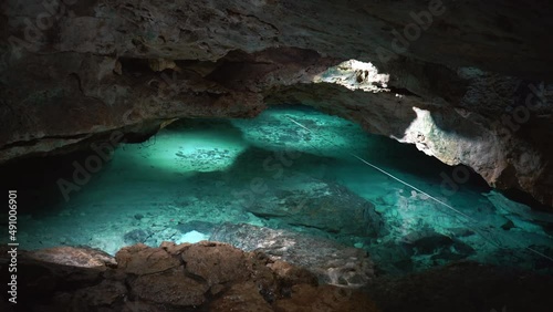 Kantun Chi caves of Yucatan Mexico cenotes. Tourism and nature concept. Cave diving in clean and clear underground water. High quality 4k footage