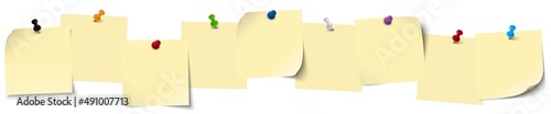 sticky notes with colored pin needles