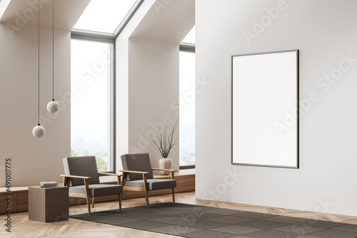 Corner view on bright living room interior with empty poster