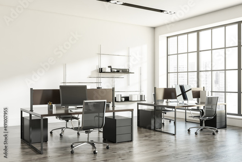 Light workplace interior with armchairs and table, shelf and window