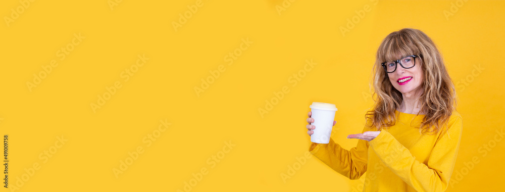 woman pointing or showing takeaway drink woman pointing or showing takeaway drink