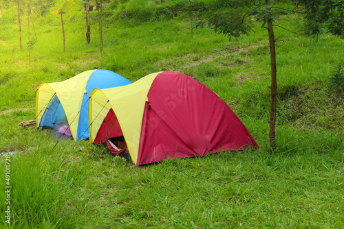 "tent or dome tent camping in mountain meadows in the morning. Camp" 