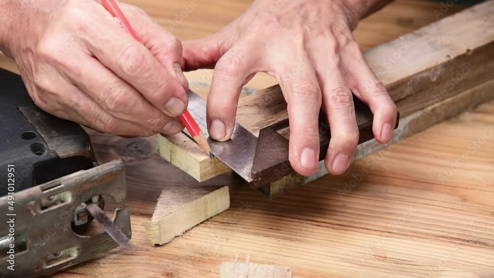 close up of a carpenter working with wood close up of a carpenter working with wood