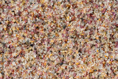 Namibia, pink grains of sand on the dunes, colorful background
