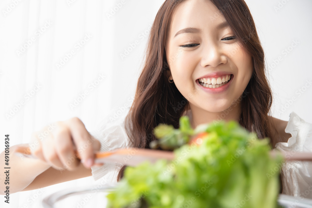 Healthy lifestyle, Close up beautiful young asian woman cooking salad smiling happy. Healthy eating, Food and lifestyle, Health, Beauty, Dieting concept. Healthy lifestyle, Close up beautiful young asian woman cooking salad smiling happy. Healthy eating, Food and lifestyle, Health, Beauty, Dieting concept.