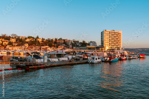 sunrise over Tarabya bay of Istanbul. REflection of boats and Tarabya hotel © Birol