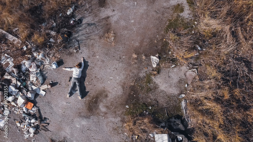 dead body the corpse of a murdered teenage girl found by drone in a garbage dump during aerial photography to search for missing people