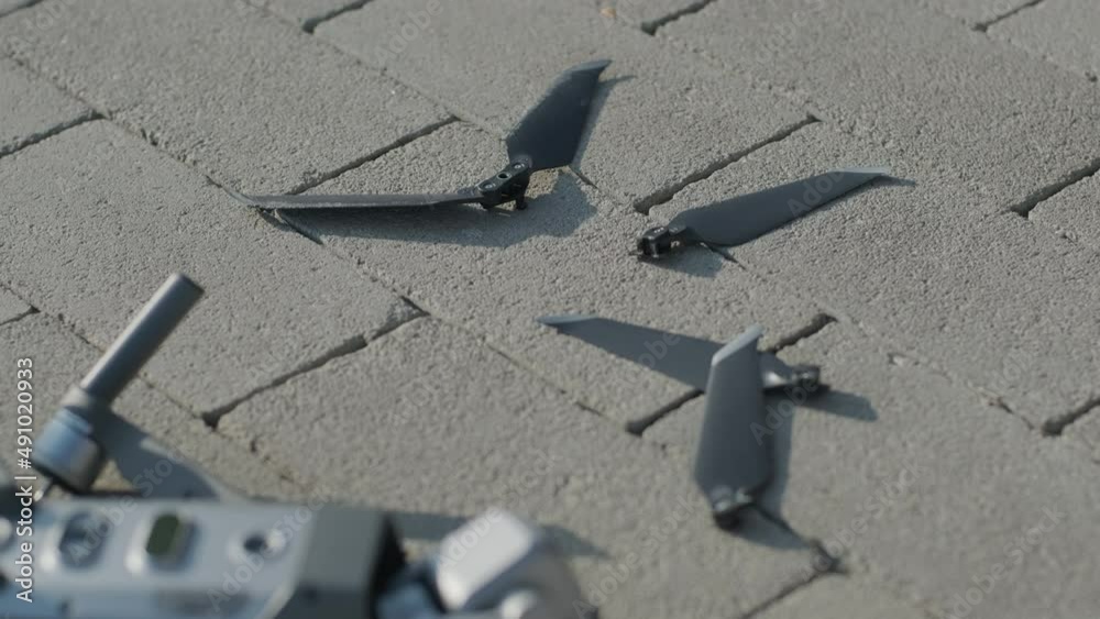 KYIV, UKRAINE - AUGUST 2021: Crashed drone lays on the ground and damaged