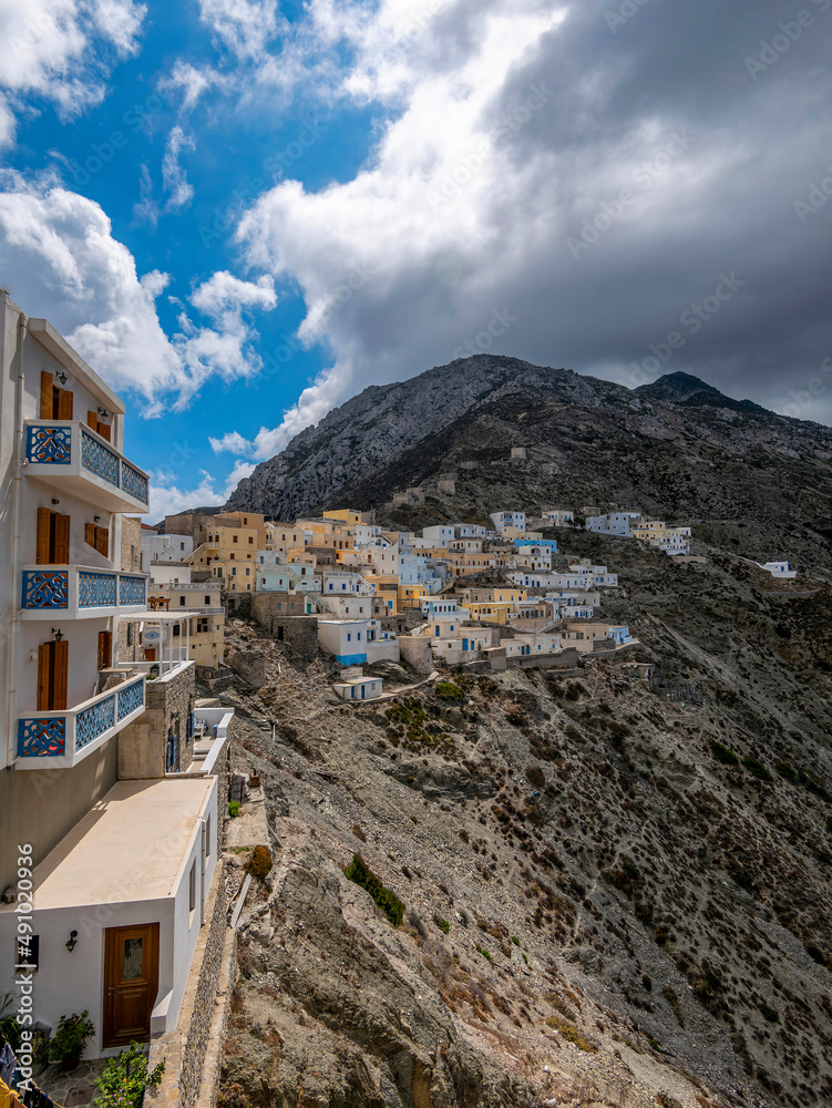 Houses on the edge of the western cliff of Olympus, Karpathos island, Greece. Houses on the edge of the western cliff of Olympus, Karpathos island, Greece.