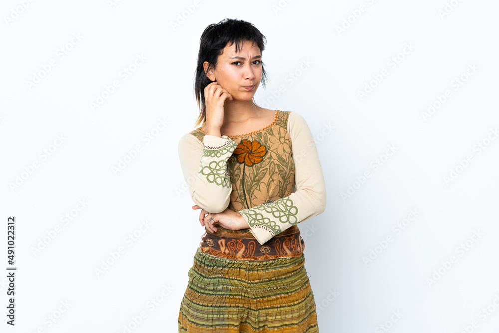 Young Uruguayan girl over isolated white background having doubts Young Uruguayan girl over isolated white background having doubts
