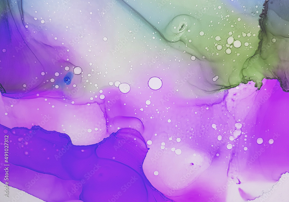 Violet, green gradient alcohol ink background. Watercolor background painting. Hand painted colorful texture. White splashes drops. There is blank place for text, for design. High resolution backdrop.