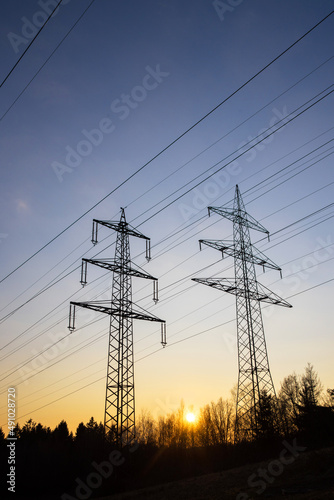 high voltage road evening sky silhouettes perpendicular