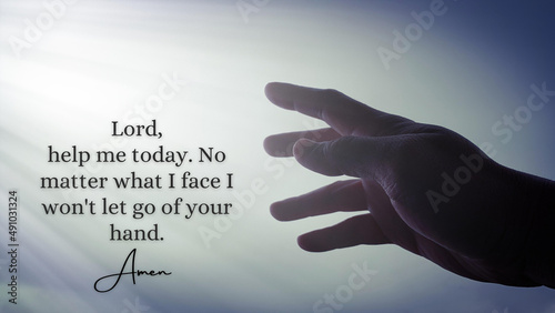 Hand reaching out to bright shining light with religious prayer - Lord help me today.