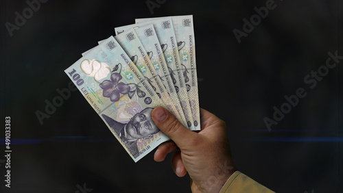 Romania Lei growing pile of money in hand concept 3d illustration