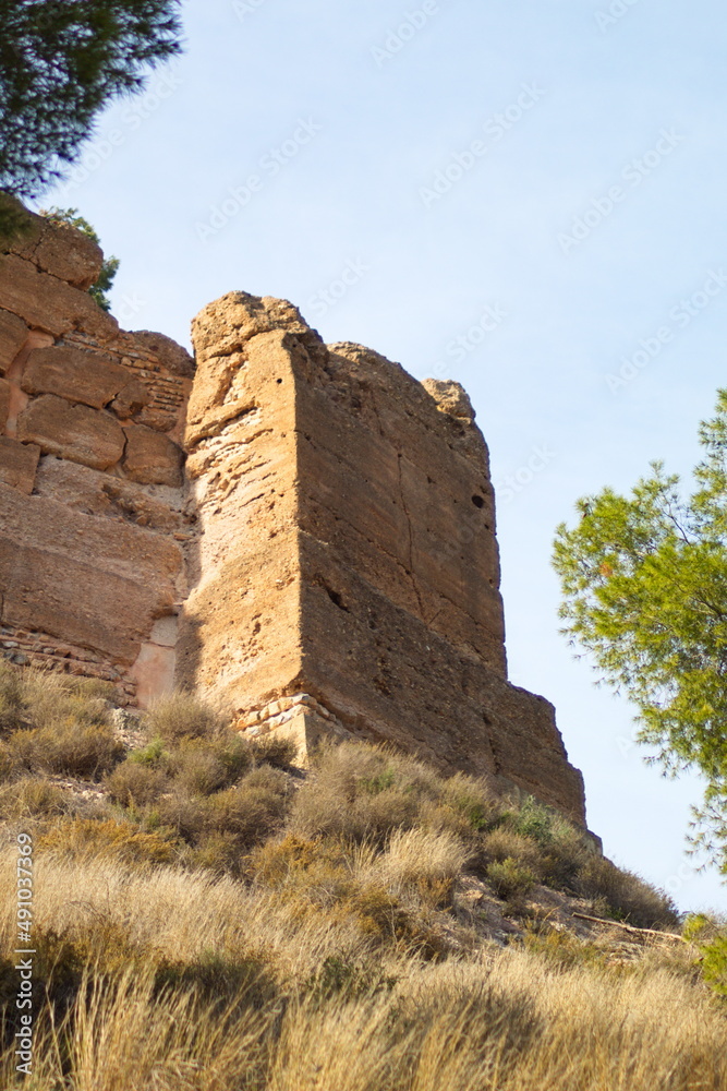 Old and deteriorated Muslim castle of La Luz located on a hill of Monte del Valle in Algezares, Murcia