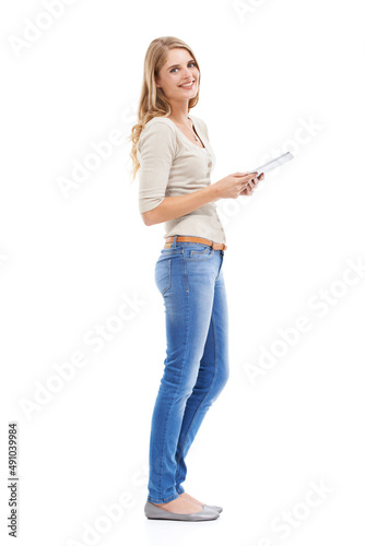 Casual confidence. Shot of an attractive young blonde woman isolated on white.