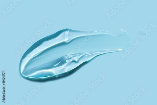 Cream gel gray blue transparent cosmetic sample texture with bubbles isolated on white background