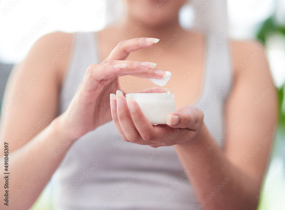 Hydrate your way to supple,smooth skin. Shot of woman holding a jar of cream. Hydrate your way to supple,smooth skin. Shot of woman holding a jar of cream.