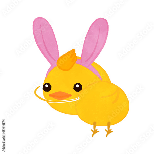 A cute chick wearing a bunny band turns around