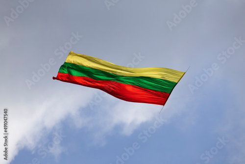 Lithuania flag waving in the wind. Patriotism and patriotism concept. photo