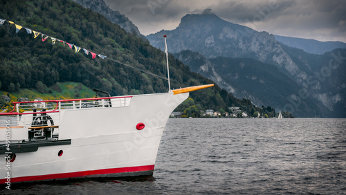 Boat in Traunsee lake, cloudy sky