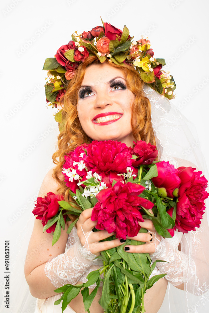 Portrait of a Ukrainian woman with peonies, happiness, joy and delight, delightful facial expressions of jubilation Portrait of a Ukrainian woman with peonies, happiness, joy and delight, delightful facial expressions of jubilation