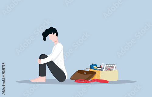 Terminated or lay off employee, being unexpectedly unemployed or fired from work concept. Employee sitting and holding knees with sadness after being dismissed from latest job.
