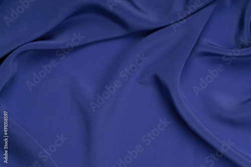Blue satin, silk, texture background. Copy space