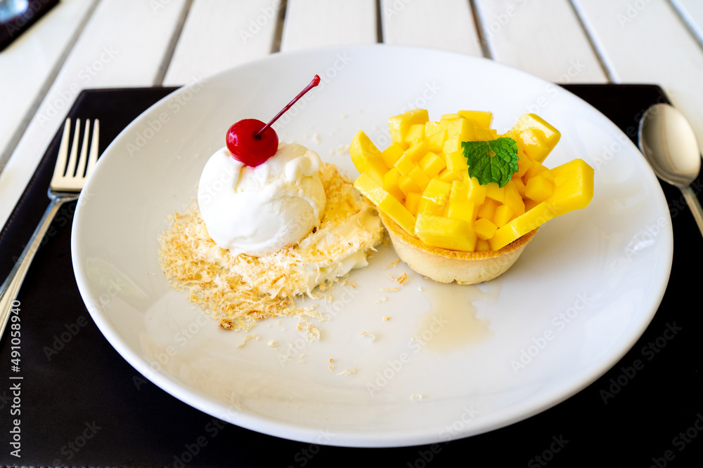 Mango tart in white plate