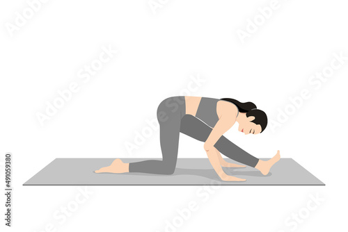 Half Splits Pose, Half Monkey Pose . Beautiful girl practice Ardha Hanumanasana. Young attractive woman practicing yoga exercise. working out, black wearing sportswear, grey pants and top, indoor