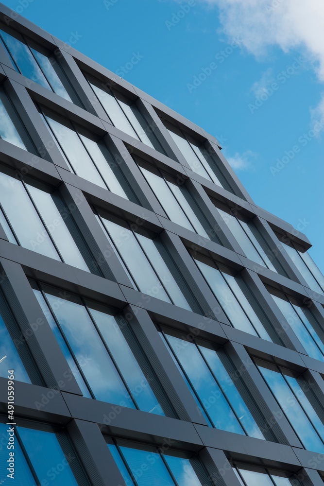 Detail of modern architecture buildings. Symbol of real estate, business, prosperity. Beautiful sunny day. Detail of modern architecture buildings. Symbol of real estate, business, prosperity. Beautiful sunny day.