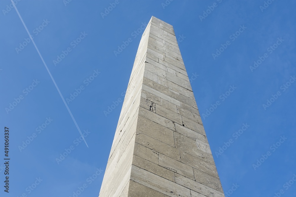Photograph of the Monument to Victims. In background with beautiful blue sky and tiny clouds. Beautiful sunny weather. Photograph of the Monument to Victims. In background with beautiful blue sky and tiny clouds. Beautiful sunny weather.