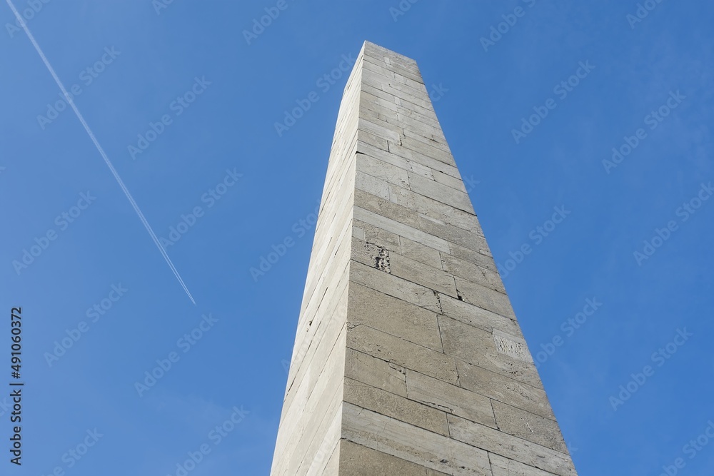 Photograph of the Monument to Victims. In background with beautiful blue sky and tiny clouds. Beautiful sunny weather. Photograph of the Monument to Victims. In background with beautiful blue sky and tiny clouds. Beautiful sunny weather.