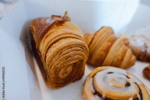 Croissant set in a paper box looks appetizing