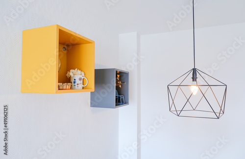 Square shelves and modern design lamp. Flat interior decor.