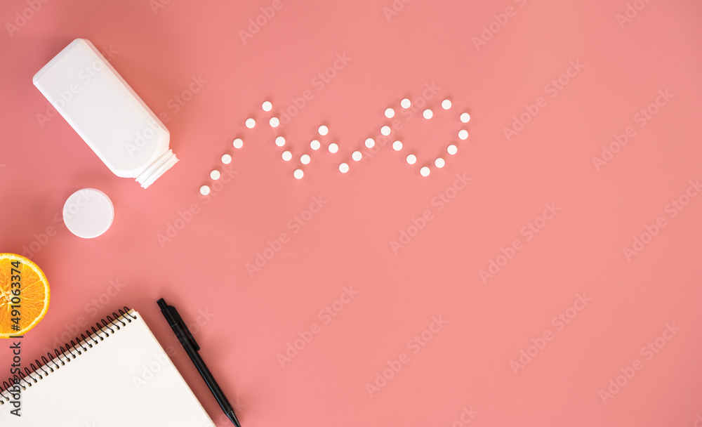 Flat lay, heart cardiogram, pills on pink background, conceptual minimalism. Flat lay, heart cardiogram, pills on pink background, conceptual minimalism.