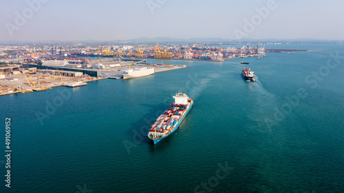 container ship, Global business import export logistic transportation of international by container cargo ship in the open sea and comercial port background,