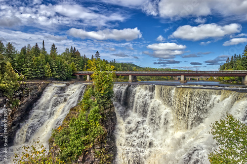 The clouds popping up from the sky above the falls - Kakabeka Falls  Thunder Bay  ON  Canada