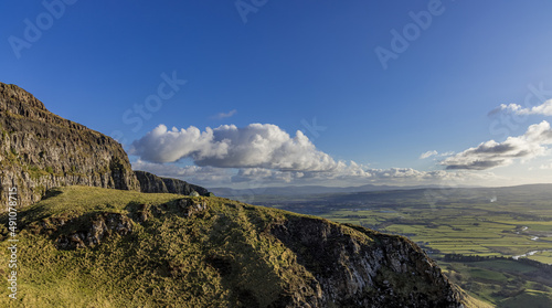 Hiking and Wild Camping, Binevenagh Mountain, Causeway coast and glens, area of oustanding natural beauty, County Londonderry, Northern Ireland photo